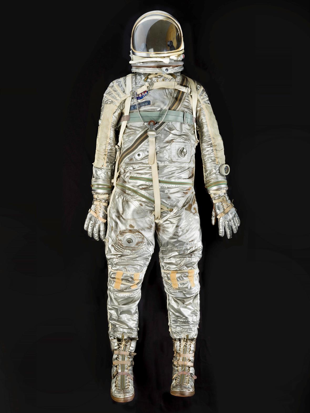 An image of the full spacesuit against a black background.