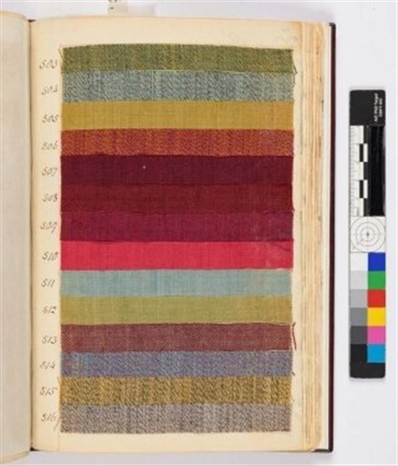 A textile with painted, colored stripes, used for testing the instrument.