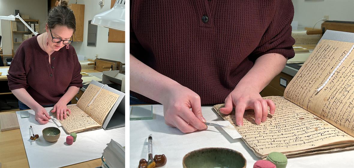 A conservator places a piece of tissue across a tear in an old book.