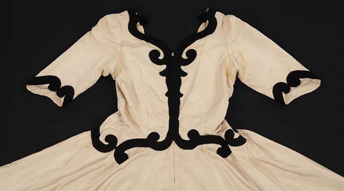 The front of the dress bodice, with visible stains.